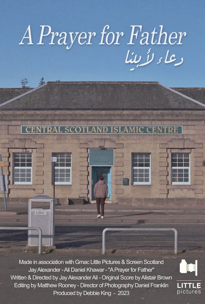 The image shows the poster for the film "A Prayer for Father". It shows a still frame image from the film of a male character crossing a road towards a building called the Central Scotland Islamic Centre. Also shows the title of the film.